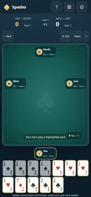 Mobile Spades layout with hand of cards and game table.